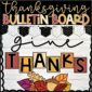 Shows the Thanksgiving Bulletin Board for the classroom with the phrase "Give Thanks"