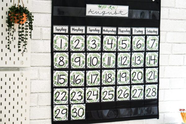 Modern Farmhouse Classroom Decor Bundle - Classroom calendar Shows a modern farmhouse classroom calendar set up in a black pocket chart