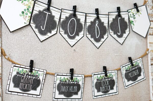 Modern Farmhouse Classroom Decor Bundle - Classroom Jobs Shows an example of the modern farmhouse classroom jobs set up