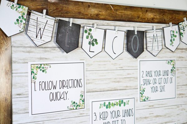 Modern Farmhouse Classroom Decor Bundle - Rules and Banner Shows a bulletin board with the welcome banner and classroom rules set up on it