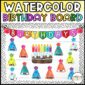 Shows a bulletin board set up with the watercolor birthday board. Includes cards for student names, months, and a banner.