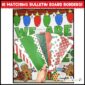 Shows the Christmas Bulletin Board Borders fanned out with the Christmas board in the background. The borders are green, red, and have a Christmas feel