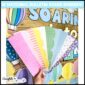 Shows the printable bulletin board borders fanned out in front of the spring bulletin board that's set up with hot air balloons