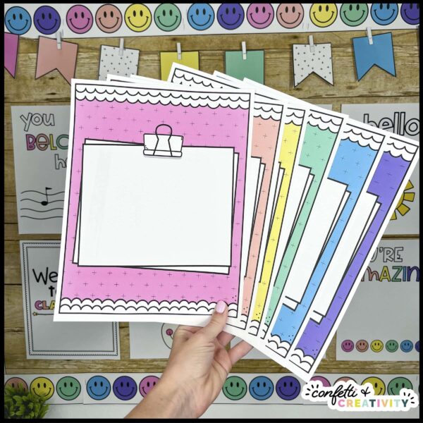 Bright Binder Covers and Binder Spines - Example Binder Covers Shows multiple binder covers fanned out in front of a classroom decorated in the bright and simple classroom theme