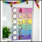 Shows the visual schedule cards on a white board set up