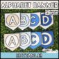 Shows the alphabet banner cards laid out on a green grass panel