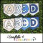 Shows the alphabet banner cards laid out on a green grass panel