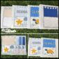 Shows multiple ocean binders laid out with the binder covers on it