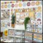 Shows a picture of the whole classroom decorated with the modern neutral classroom theme. Features alphabet posters, a 10 drawer cart labels and so much more