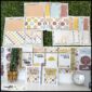 Shows all of the printed out binder covers laid out on a grass panel