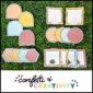 Shows multiple different sizes and shapes of the modern neutral classroom labels laid out on a grass panel