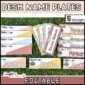 Shows the desk name plates laid out on a grass panel and filled out