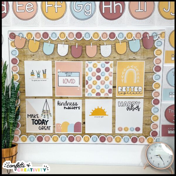 Neutral Inspirational Posters - In Classroom Shows the posters set up on a bulletin board in a real classroom. On top of the bulletin board are alphabet posters