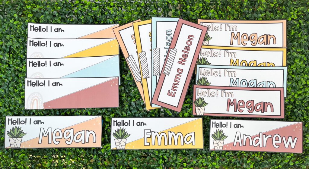 Neutral Desk Name Plates laid out on a grass panel