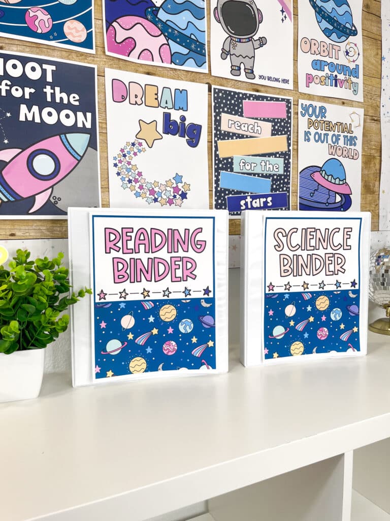Shows space themed binder covers and space inspirational posters