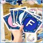 Shows fanned out alphabet banners with space classroom theme.