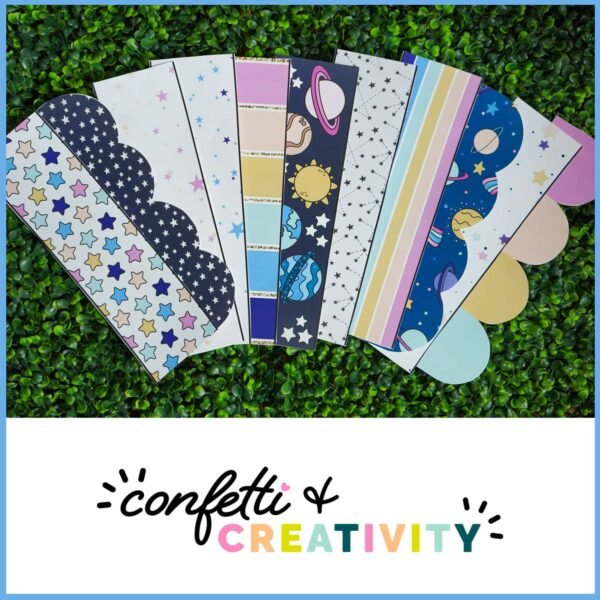 Space Bulletin Board Borders 3 Shows the printable bulletin board borders on a green grass panel