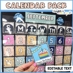 Shows the classroom calendar in a black pocket chart, while holding a holiday card for a birthday