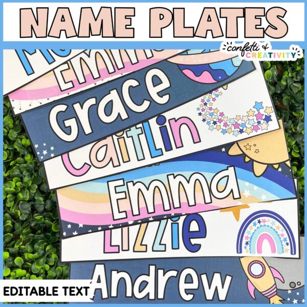 Shows the space themed desk name plates for students. Includes multiple fanned out designs sitting on a green grass panel to show full colors