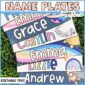 Shows the space themed desk name plates for students. Includes multiple fanned out designs sitting on a green grass panel to show full colors