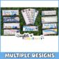 Shows a collection of all of the student desk name plates included in the product sitting on a green grass panel