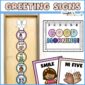 Shows the morning greeting signs on a classroom door connected with a ribbon