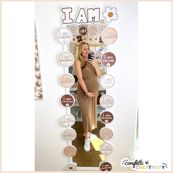 Neutral Affirmation Station - Megan Taking Photo in Mirror Shows affirmation mirror with "I Am" at the top of the mirror and affirmations all around the mirror