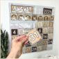 Shows Megan holding the number 31 with the classroom calendar in the background