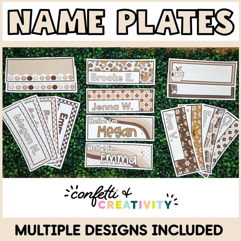 Shows Multiple desk nameplates laid out on a grass panel with various names on them