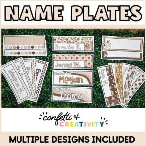 Shows Multiple desk nameplates laid out on a grass panel with various names on them