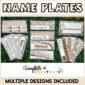 Shows Multiple desk nameplates laid out on a grass panel with various names on them