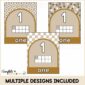 Shows all 3 different designs of the number 1. One example has a neutral background set of daisies, another has pencils, and another is a checkered background.