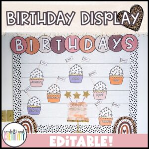 Shows the birthday board from the boho neutral classroom theme set up in a real classroom. Features cupcakes for each month and a large cake in the center of the board